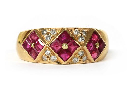 A gold ruby and diamond ring,