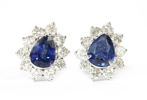 A pair of white gold sapphire and diamond cluster earrings,