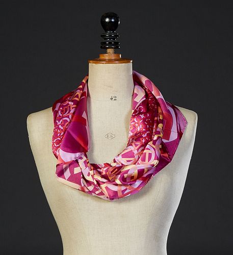 Vintage Chanel Silk Scarf, in multi-color "Chanel" print with a fuscia background and hand rolled edges, made in Italy, H.- 16 1/2 in., W.- 60 in.