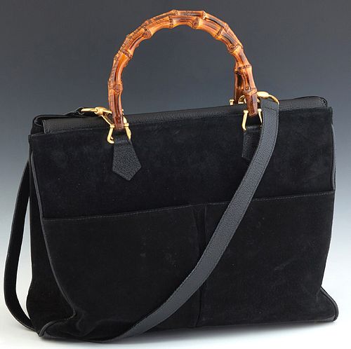 Gucci Bamboo Shoulder Bag, in black suede and calf leather with gold hardware, the magnetic metal closure opening to a black canvas lined interior wit