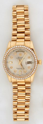 Man's Rolex Presidential 18K Yellow Gold Oyster Perpetual Day-Date Wristwatch,  Model # 118238, Serial # F602515, with a diamond bezel, and diamond mo