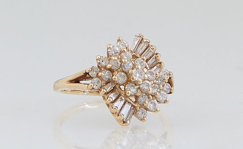 Lady's 14K Yellow Gold Diamond Cluster Dinner Ring, the top center with three rows of five point round diamonds, flanked on the top and bottom by a ve