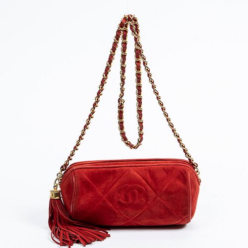 Chanel Tassel Diamond Bowling Shoulder Bag, c. 1986, in red diamond quilted suede with golden hardware, opening to a red calf leather lined interior w