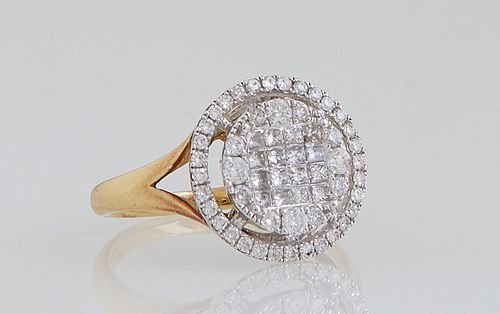 Lady's 14K Yellow Gold Dinner Ring, the circular top with round and princess cut diamonds, within a pierced outer border of tiny round diamonds, on a 