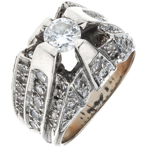 RING WITH DIAMONDS IN 12K WHITE GOLD 1 Brilliant cut diamond ~0.70 ct, 8x8 cut diamonds ~0.70 ct. Size: 8 | ANILLO CON DIAMANTES EN ORO BLANCO DE 12K 