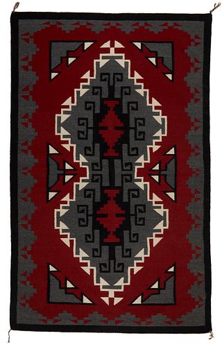 A Navajo Ganado-style rug