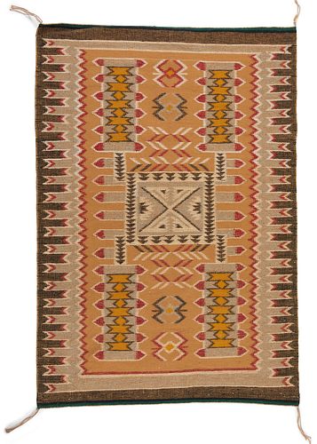 A Navajo regional raised outline rug, by Mary Yazzie