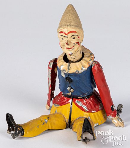 Gunthermann painted tin wind-up scooting clown toy