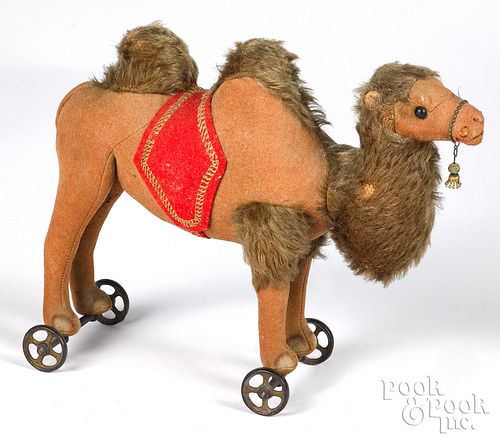 Steiff Bactrian camel pull toy on a wheeled base