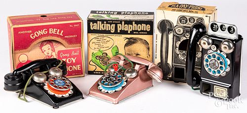 Three boxed Gong Bell toys