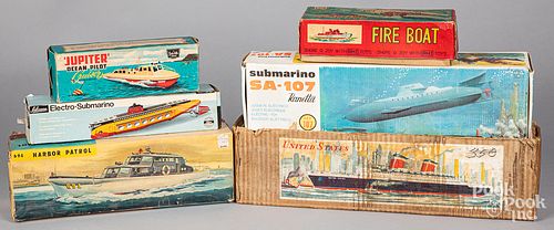 Group of toy boat boxes.