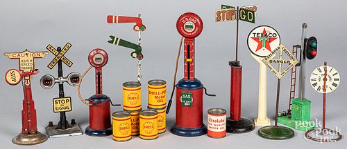 Group of railroad signs and gas pumps