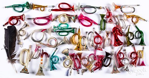Group of glass horn Christmas ornaments.