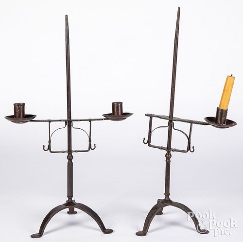 Two contemporary iron candlestands