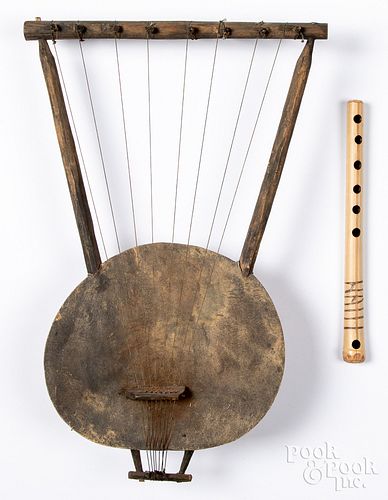African lyre, together with a bamboo flute