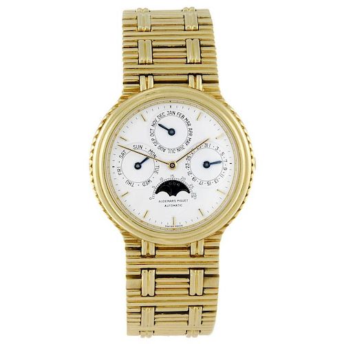 AUDEMARS PIGUET - a gentleman's QuantiÞme PerpÚtuel bracelet watch. 18ct yellow gold case. Numbered