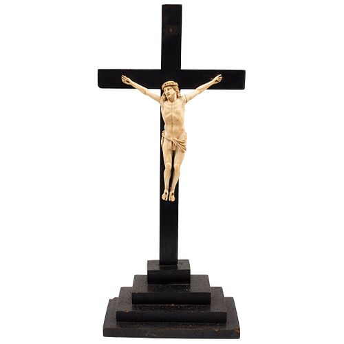 CRUCIFIED CHRIST, EARLY 20TH CENTURY, Carved in ivory, Conservation details, Christ: 10.2 x 7.8" (26 x 20 cm), Cross: 25.9 x 11.8" (66 x 30 cm) | CRIS