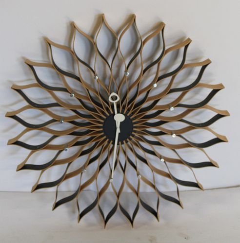 Midcentury Starburst Form Laminate Wood Clock.