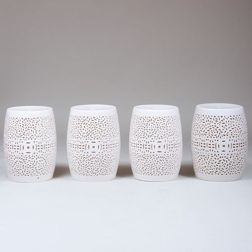 Group of Four Chinese White Glazed Pierced Porcelain Garden Seat Lights