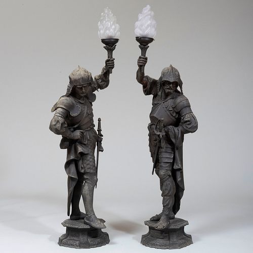 Pair of Patinated Metal Figural TorchÃ¨res