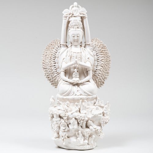 Chinese White Glazed Porcelain Figure of Seated Deity