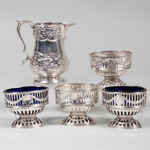 Set of Four George III Silver Salts with Two Blue Glass Liners and a Cream Jug