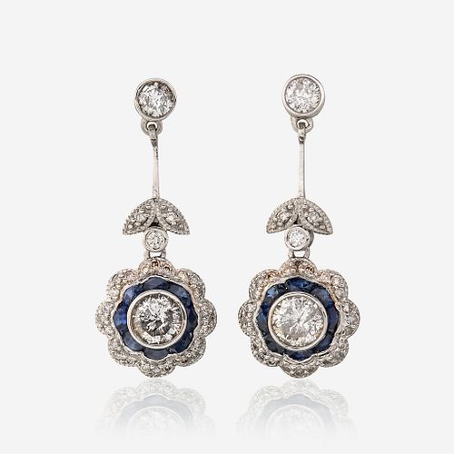 A pair of diamond, sapphire, and platinum earrings