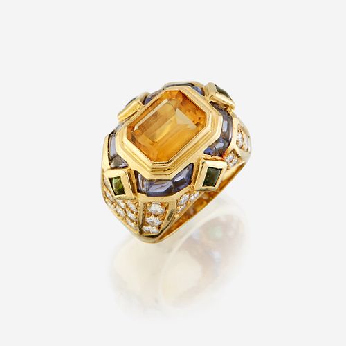 A citrine, diamond, sapphire, peridot, and eighteen karat gold ring