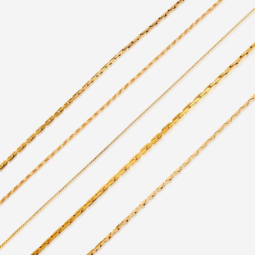 A collection of five fourteen karat gold necklaces