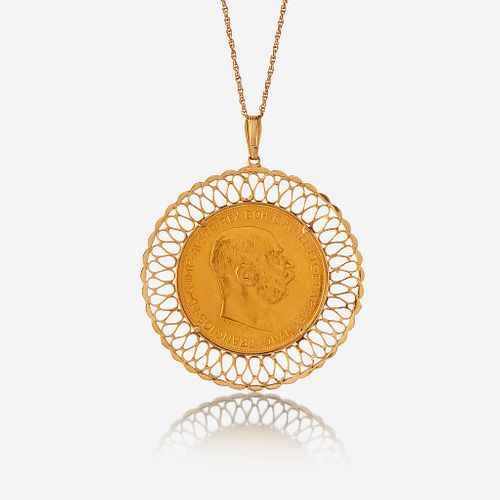 An eighteen karat gold coin pendant