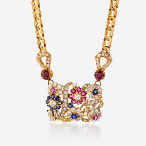 An eighteen karat gold, diamond, sapphire, and ruby necklace