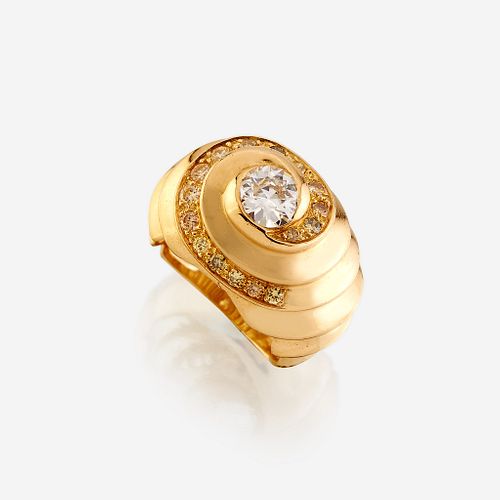 A diamond, colored diamond, and eighteen karat gold ring