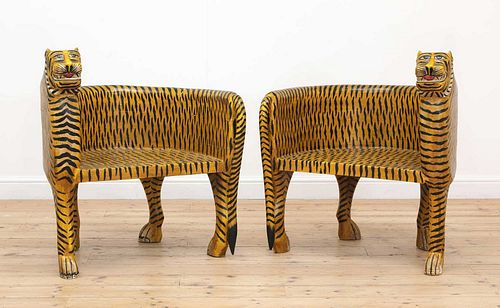 A pair of carved wooden papier mâché and painted chairs,