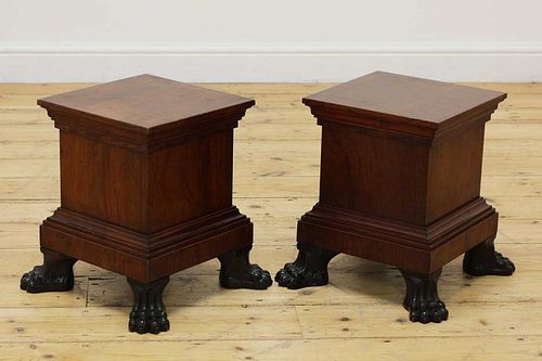 A pair of mahogany stands,