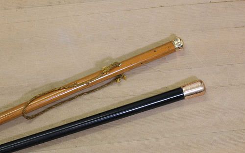 Two gold-mounted walking canes,