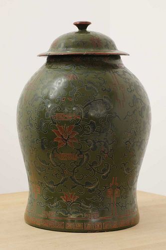 A green-lacquered papier-mâché vase and cover,