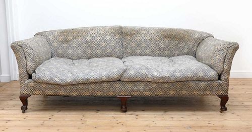 A three-seater 'Fielding' sofa by Howard & Sons,