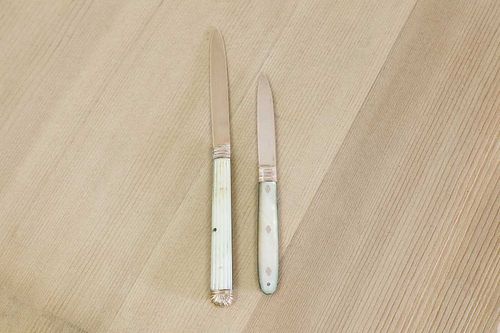 Two gold and mother-of-pearl folding fruit knives,