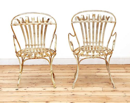 A pair of François Carré 'Sunburst' garden chairs,