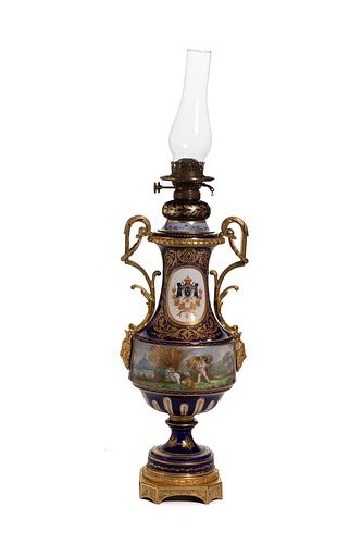 A Sevres-style porcelain wick lamp