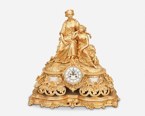 A French gilt-bronze figural mantel clock