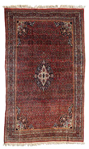 A Tabriz-style rug