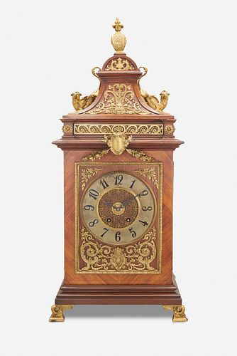 A French gilt-bronze mounted wood mantel clock