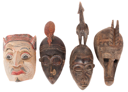 (4) Carved Wood Figural Masks