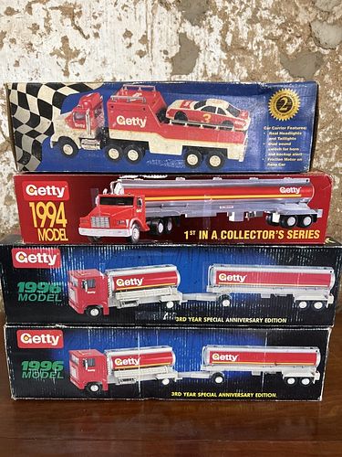 Four Getty Toy Trucks