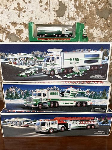 Four Hess Toy Trucks