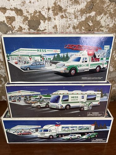 Three Hess Toy Trucks