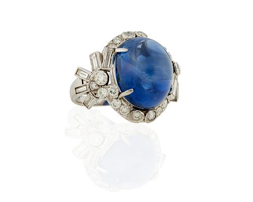 A cabochon sapphire and diamond ring