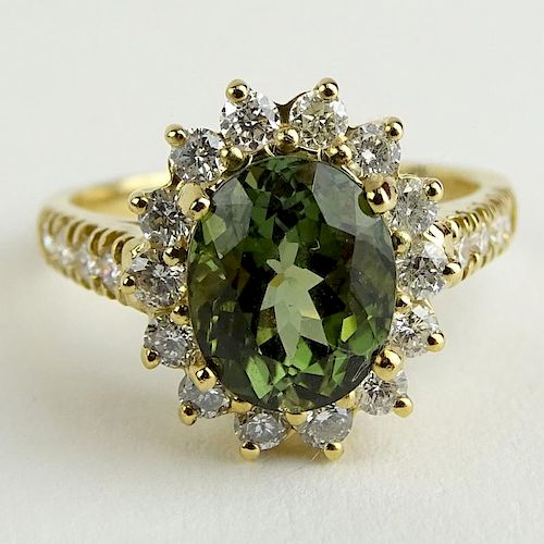 Lady's BHGL Appraised 2.35 Carat Oval Cut Green Tourmaline Yellow Gold Ring.
