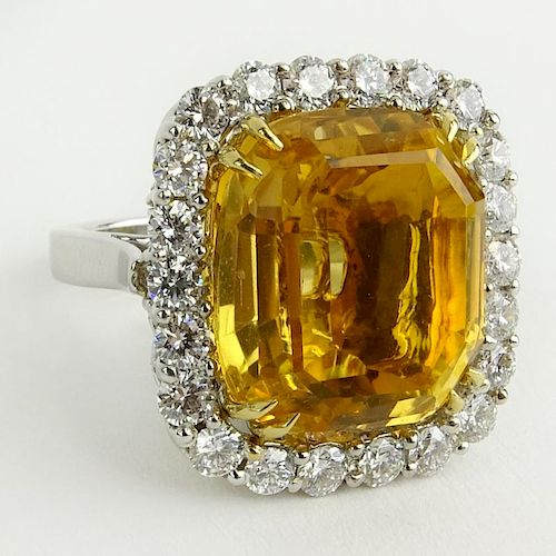 Large 23.01 Carat Cushion Cut Citrine, 2.26 carat Round Cut Diamond and 18 Karat Gold Ring. Diamonds F-G color, VS clarity.